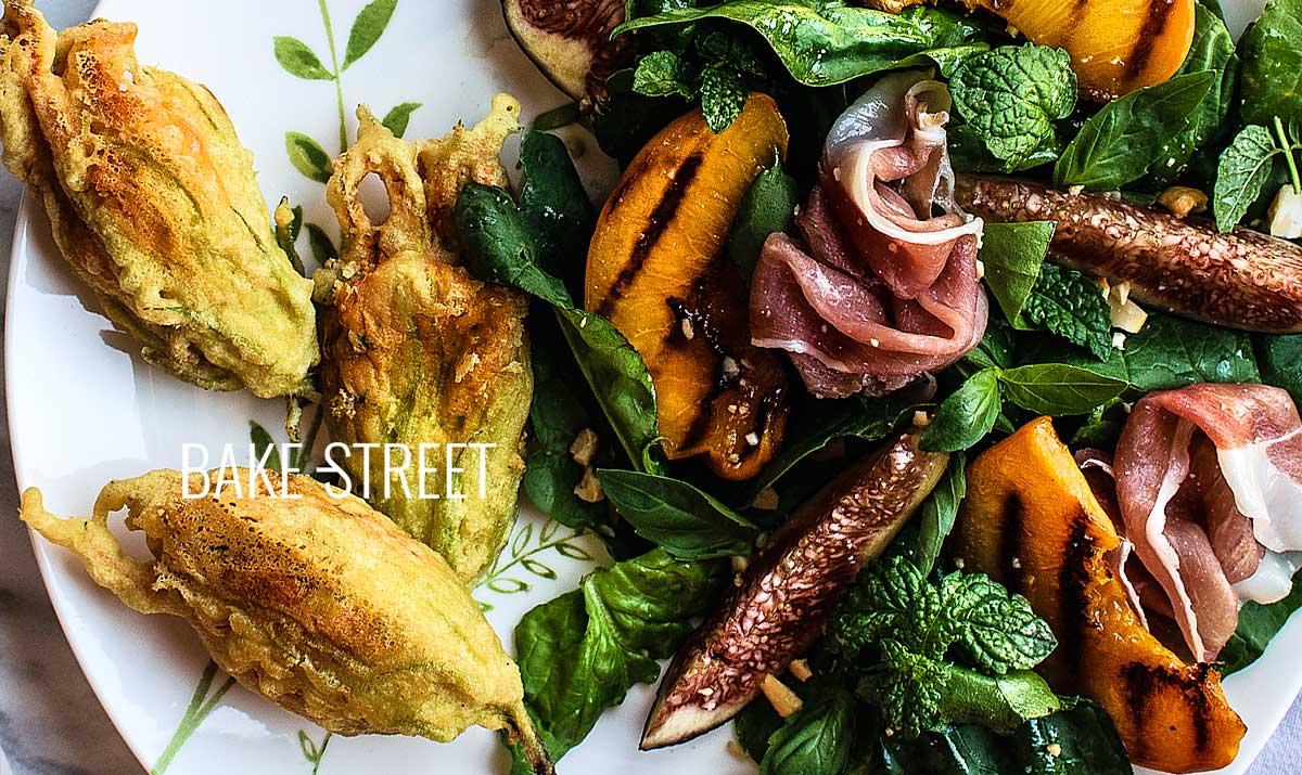 Stuffed squash blossoms with grilled peach salad