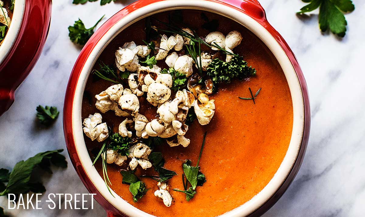 Tomato soup with plum, Bourbon and spicy popcorn