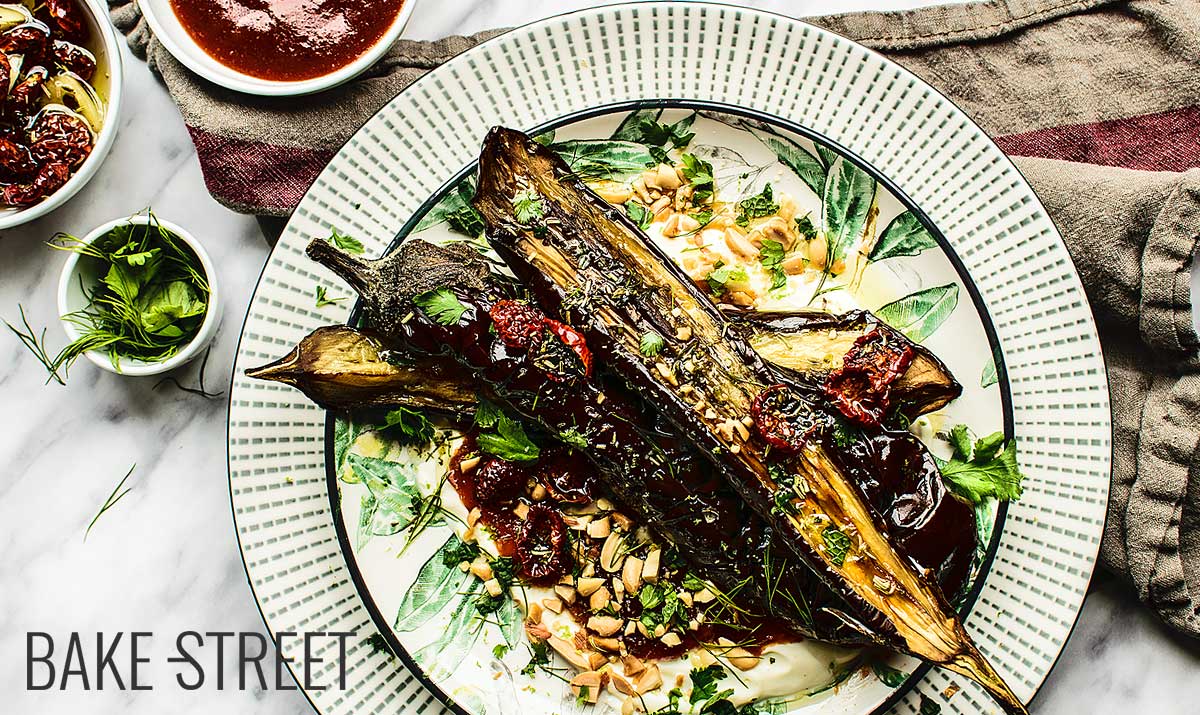 Roasted eggplants with tomato jam and peanuts